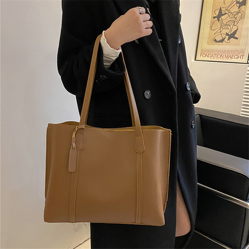 حقيبة يد كلاسيكية سوداء من الج - مراجعة Leather Work Handbag وسعره