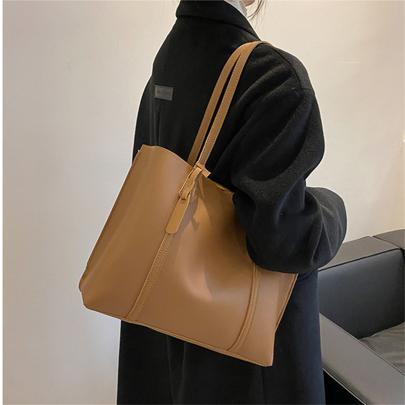 حقيبة يد كلاسيكية سوداء من الج - مراجعة Leather Work Handbag وسعره